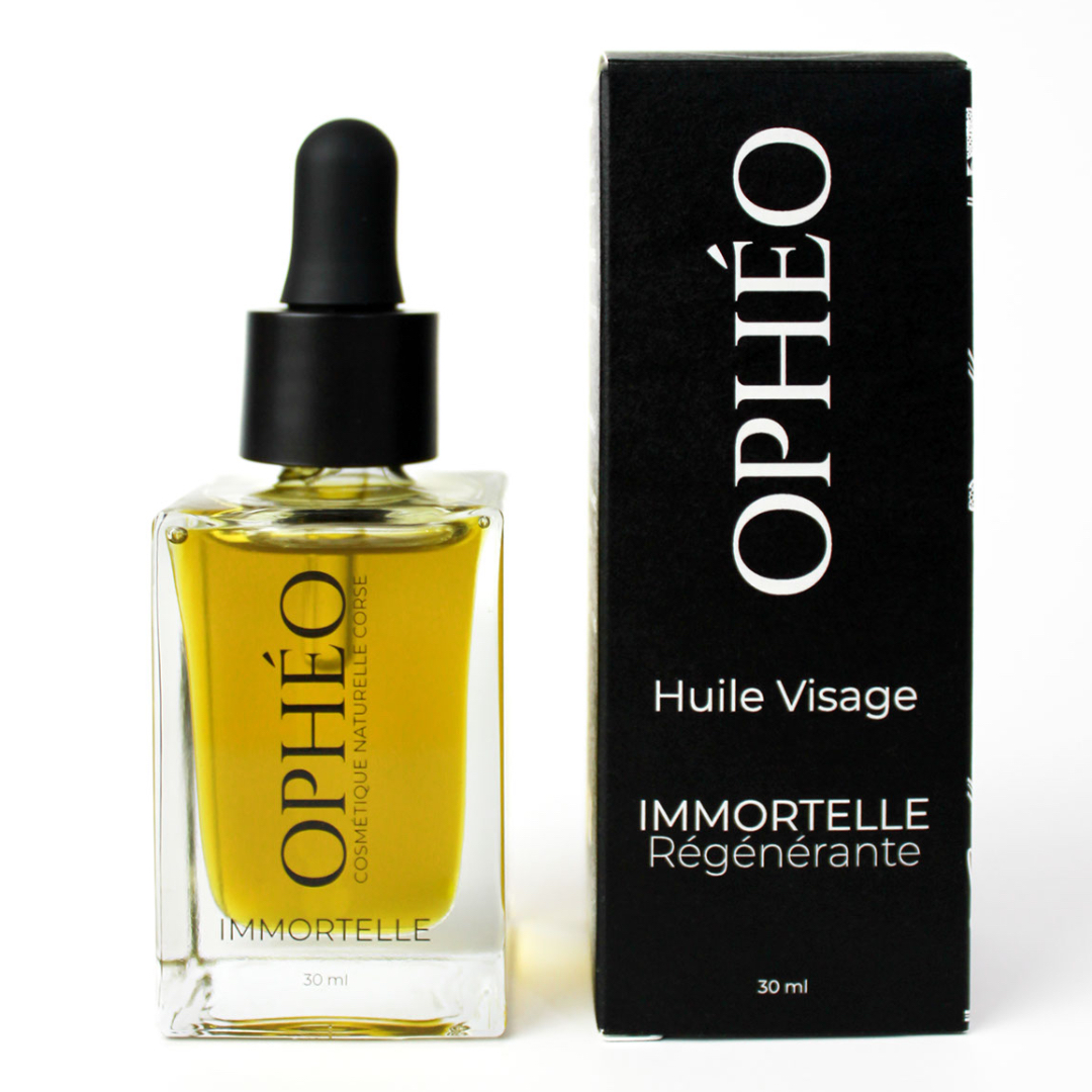 Huile Visage Immortelle Régénérante 2 Un flacon d'Huile Visage Immortelle Régénérante de la marque OPHÉO, accompagnée de son emballage carton, noir et blanc au style élégant et épuré.