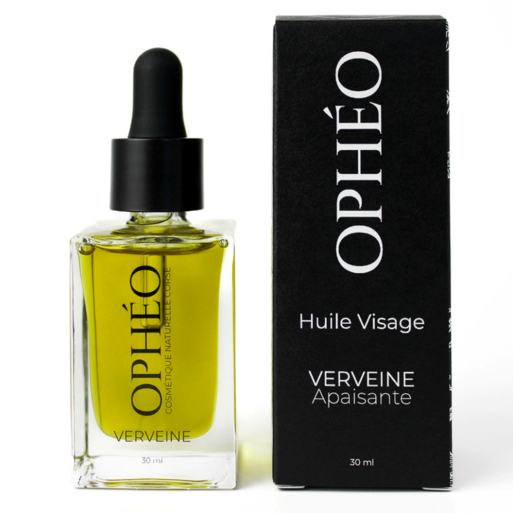 Huile Visage Verveine Apaisante 4 Un flacon d'Huile Visage Verveine Apaisante de la marque OPHÉO, accompagnée de son emballage carton, noir et blanc au style élégant et épuré.